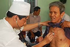 Elderly vietnamese man gets examined