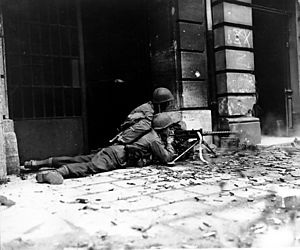 GI machine gun crew in Aachen (Correct orientation).jpg