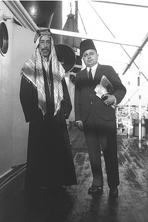 EXILED KING ALI OF HEJAZ WITH THE EDITOR OF THE JAFFA ARAB DAILY "PALESTINE" ABOARD A SHIP AT THE JAFFA PORT. עלי מלך חג'אז בצילום משותף עם עורך העיתוD1-017