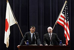 Ishiba and Gates with flags