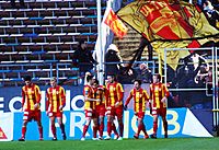 Syrianska supporters waving a flag