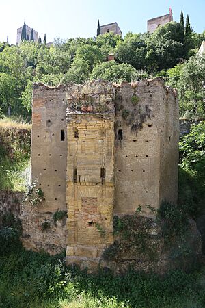 Aa old gateway across rio darro in albaicin in granada