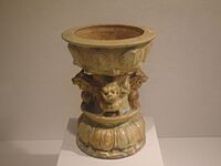 Footed lamp with lions, earthenware, 6th century