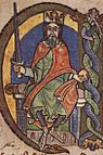 Coloured illumination of a seated mediaeval king