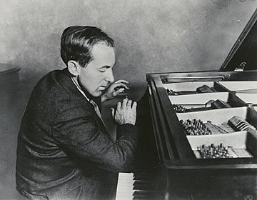 Henry Cowell playing the piano