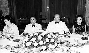 Hoveida and Demirel