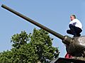 Young Man on Soviet-Era Tank - Tiraspol - Transnistria (36420526970)