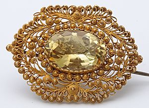 Citrine cannetille work brooch