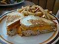 Tuna melt sandwich with fries