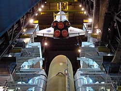 Space Shuttle Discovery lowered toward external tank and solid rocket boosters (STS-124)