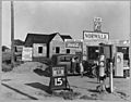 Riverbank, San Joaquin Valley, California. Newly-built store and trading center typical of new shack . . . - NARA - 521694