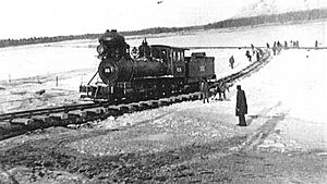 Alaska Railroad engine crossing the Tanana River on the ice at Nenana just prior to completion of the railroad