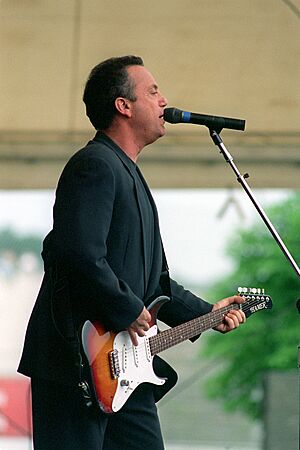 Billy Joel with guitar 1994