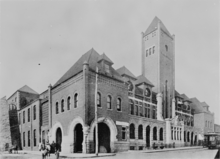 Black and white photograph of the Car Barn prior to its re-design in 1911