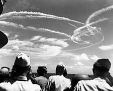 Fighter plane contrails in the sky