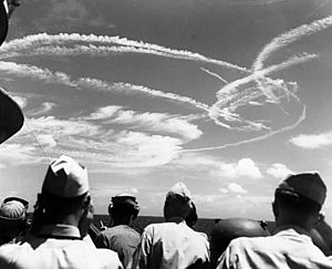 Fighter plane contrails in the sky