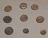 9 gold coins from the Cheriton Hoard on display at Winchester City Museum