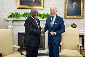 President Joe Biden and South African President Cyril Ramaphosa shake hands in the Oval Office