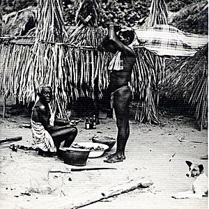 Body of Maroon child brought before medicine man, 1955