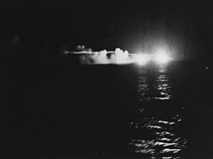USS St. Louis (CL-49) and HMNZS Leander firing during the Battle of Kolombangara, 13 July 1943 (80-G-342763)