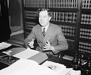 Huey Long at desk