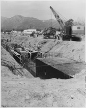 La Crescenta District. Eagle-Sheilds Channel. View north from Mayfield Avenue showing a covered section in the... - NARA - 295327