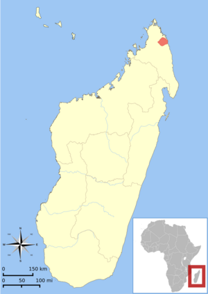 Map of Madagascar off the African coast, showing a highlighted range (in red) as a small area in the northeast corner of the island.