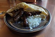 Bosnian-cevapi-with-kajmak-and-onion