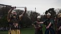 Romans (Antonine Guard Living History Society) saluting at the Roman vs Picts 5k race, Callendar House