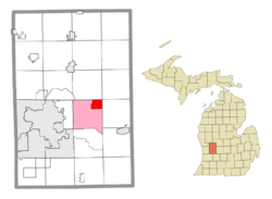 Location within Kent County (red) and an administered portion of the Forest Hills CDP (pink)