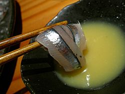 Kibinago sashimi with chopsticks by jetalone in Kagoshima