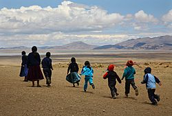 Children play outside school in the community of Maquilaya, Ancoraimes Municipality.