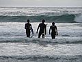 Surfers At Cardiff Reef