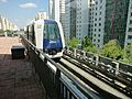 Train pulling into Cove LRT station