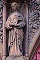 Statue carved from red sandstone on Grayfriars Church, Dumfries