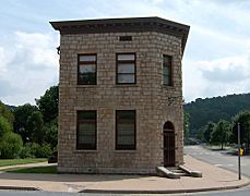 A stone bank with front corners cut at forty-five degree angles