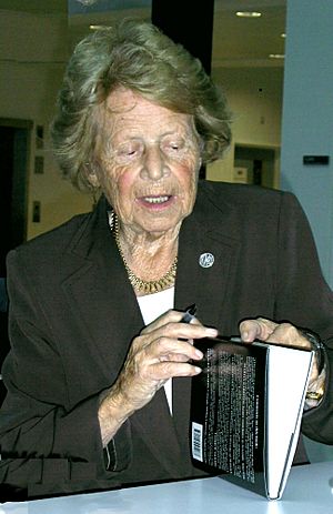 Dame Kathleen Ollerenshaw signing book.jpg