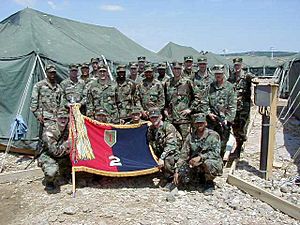 2BDE 1ID Kosovo 1999 colors unfurled