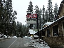 The town as seen heading eastbound on US-50. The sign references a well-known joke about small towns.