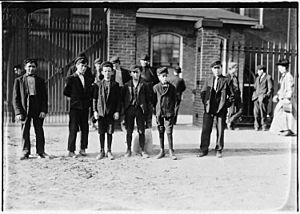 Smallest boy is Joseph Fortin. His mother (at home) said he is 14 years old. He does not look it. 6 A.M. Group going... - NARA - 523199