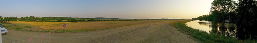 Looking west from Satartia. The Yazoo River has flooded the buildings to the right of the levee.