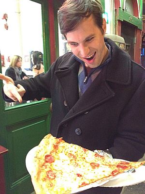 Young man with jumbo slice