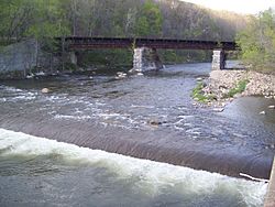 Hoosic River railroad bridge and weir North Adams