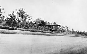 Two Spitfires taking off from an airstrip near Darwin in March 1943