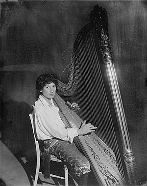 Harpo Marx playing the harp