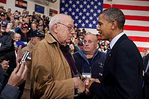 Obama and Hector Cafferata shake hands