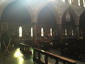 St Cuthberts interior south wall stations of the cross and lectern listed building No. 266119