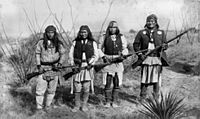 Apache chieff Geronimo (right) and his warriors in 1886