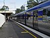 A comeng train (operated by connex)  at the single platform station at Ashburton