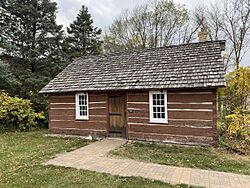 Historic 1857 Cabin originally on Wolsfeld Lake, now moved to City Hall